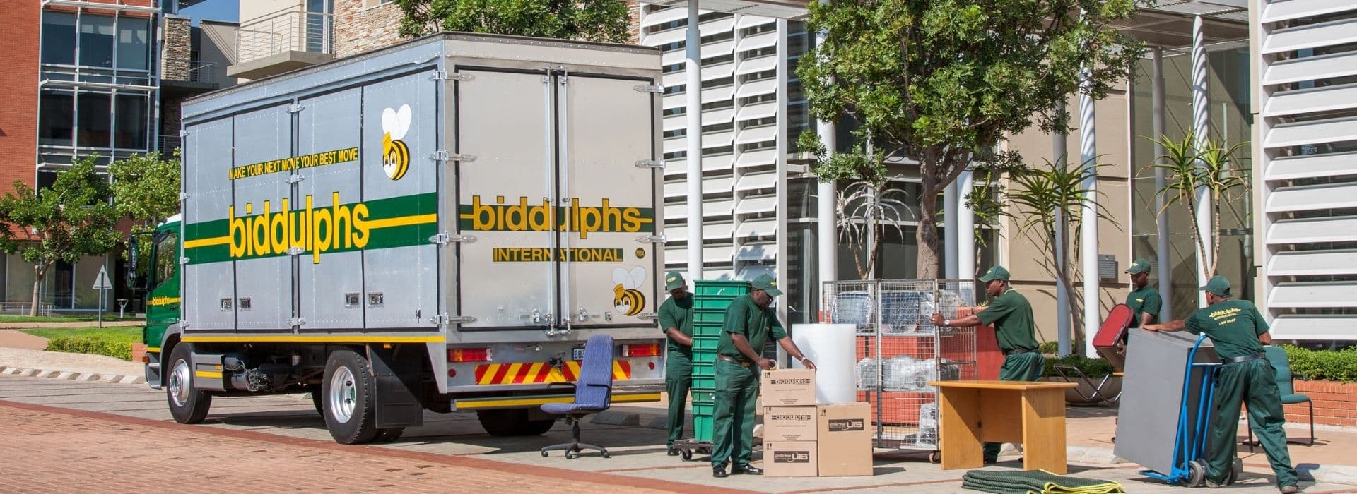 Office relocation team packing equipment and files