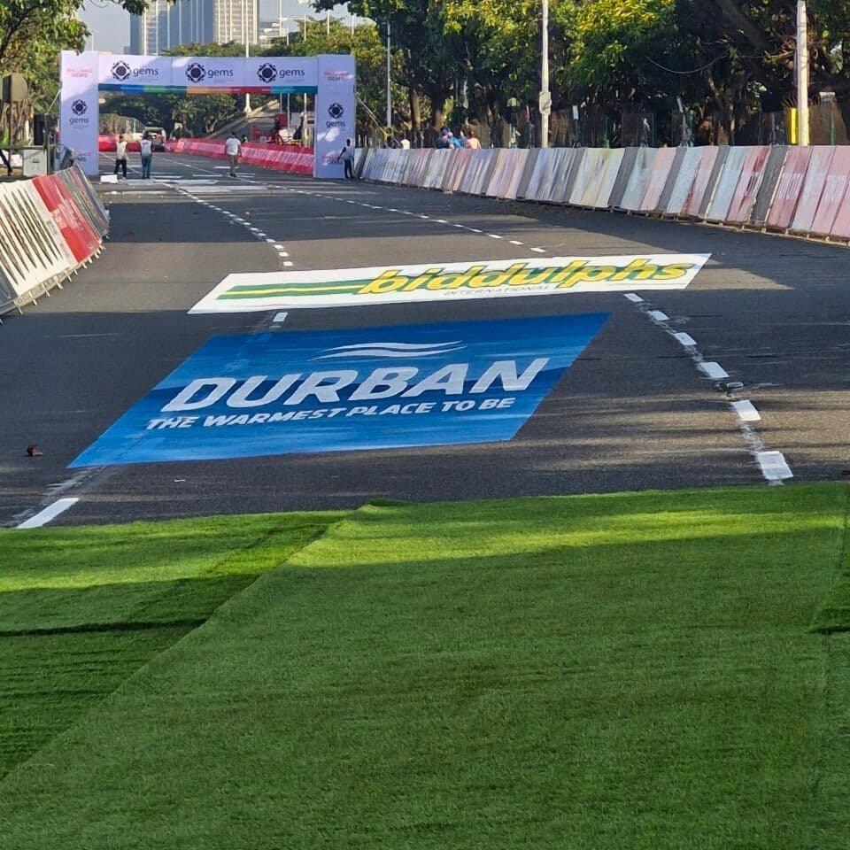Biddulphs International logo painted on the road at the Durban start line