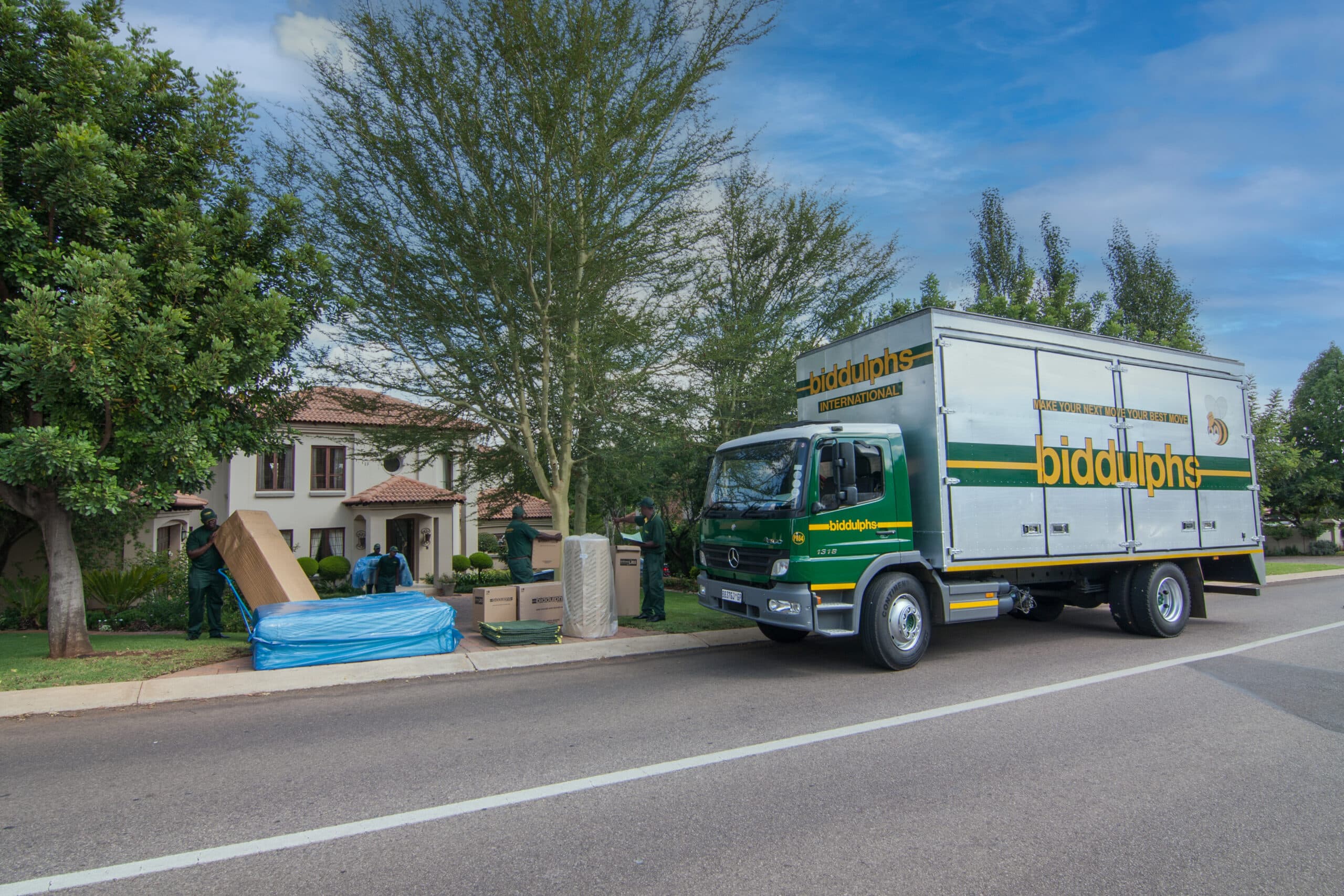 Biddulphs moving team loading furniture into a truck